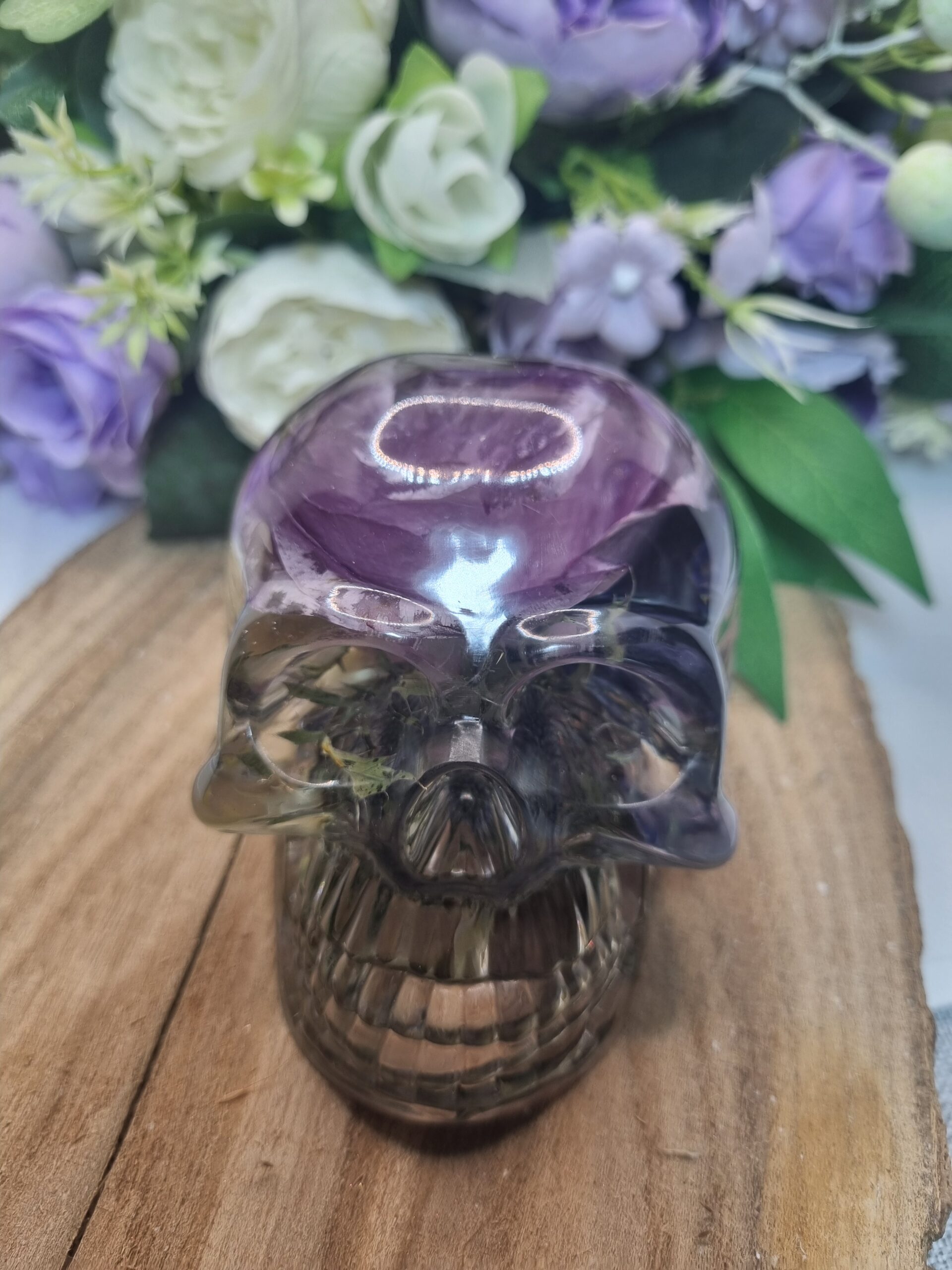 Resin Skull with Purple and white flowers Resin Skull with Purple and white flowers