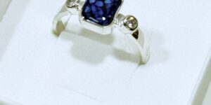 Caroline Emerald Cut ring with Ashes