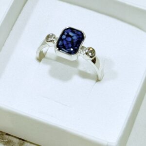 Caroline Emerald Cut ring with Ashes